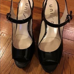 Black patent leather peep toe heel